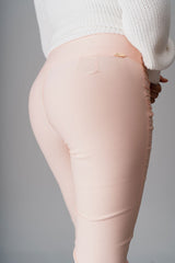 Peach pants made with lightweight fabric